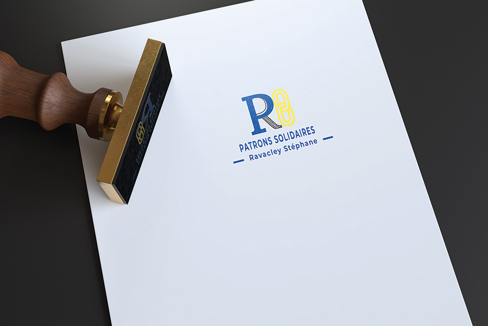 logo bleu et jaune tampon sur papier blanc